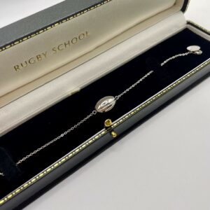 Silver rugby ball bracelet